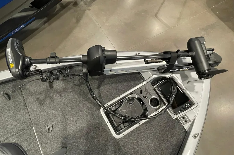 Slide: The Image of 2025 Vexus AVX1980C boat with Minn Kota trolling motor and control panel. - 5