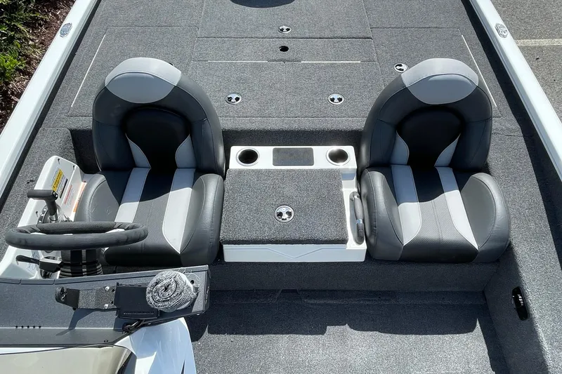 Slide: The Image of 2025 Vexus AVX1980 boat interior with dual seats and steering wheel. - 5