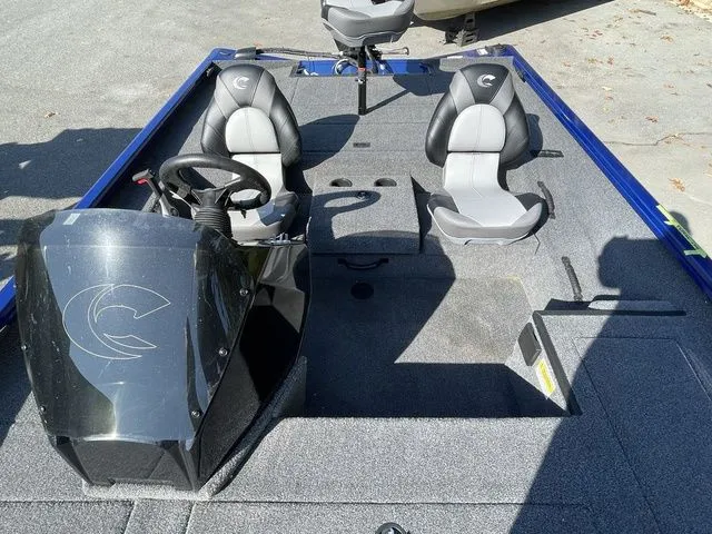 Slide: The Image of 2023 Crestliner XFC 179 boat interior with dual seats and steering console. - 12