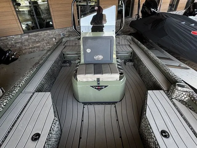 Slide: The Image of 2025 Vexus ACX2150 boat interior with sleek seating and modern design. - 10