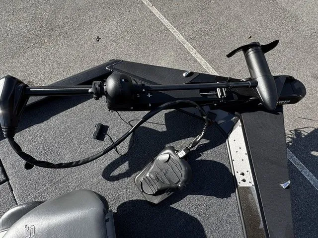 Slide: The Image of 2023 Vexus AVX181 boat deck with trolling motor and foot pedal controls. - 10