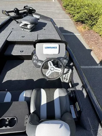 Slide: The Image of 2023 Vexus AVX181 boat interior with Lowrance navigation system and seating. - 6