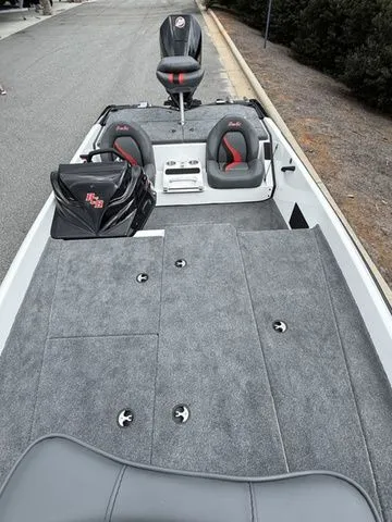 Slide: The Image of 2026 Bass Cat Pantera Classic boat with gray carpet and seating, ideal for fishing. - 10