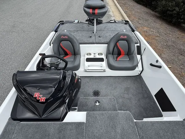 Slide: The Image of 2026 Bass Cat Pantera Classic boat interior with dual seats and steering console. - 11