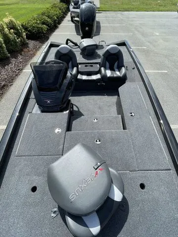 Slide: The Image of 2023 Vexus AVX181 boat with sleek seating and spacious deck design. - 10