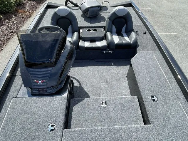 Slide: The Image of 2023 Vexus AVX181 boat interior with dual seats and storage compartments. - 11