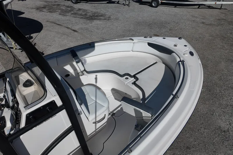 Slide: The Image of 2021 Robalo R222 Center Console boat interior with seating and console view. - 11
