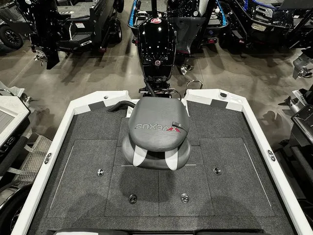 Slide: The Image of 2024 Vexus AVX1980C boat interior with seating and motor, showcasing modern design. - 14