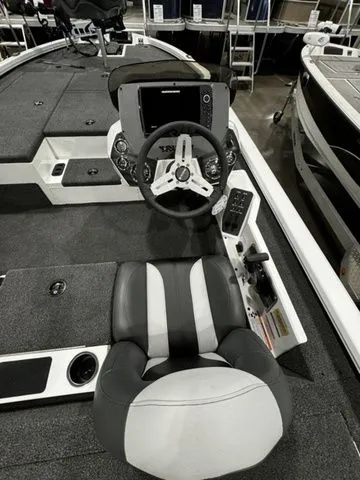 Slide: The Image of 2024 Vexus AVX1980C boat interior with steering wheel and seat, showcasing modern design. - 5