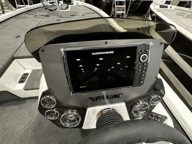 Slide: The Image of 2024 Vexus AVX1980C boat dashboard with Humminbird Helix 9 fishfinder and gauges. - 6