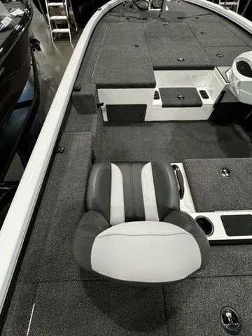 Slide: The Image of 2024 Vexus AVX1980C boat interior with gray seating and storage compartments. - 7