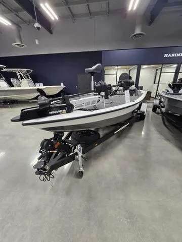 Slide: The Image of 2024 Vexus AVX2080 boat displayed indoors, featuring a sleek design and modern equipment. - 5