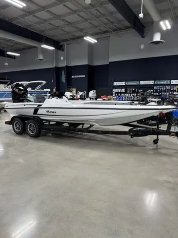 The Image of 2025 Ikon Boats VLX21 on trailer in showroom, sleek design, modern features. - 1