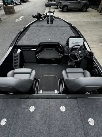 Slide: The Image of 2025 Ikon Boats VLX21 interior with Garmin system, featuring sleek seating and modern design. - 3