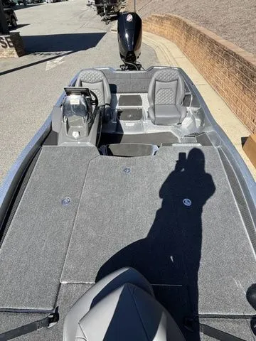 Slide: The Image of 2026 Ikon Boats VLX20 with spacious deck and dual seating, ideal for fishing adventures. - 12