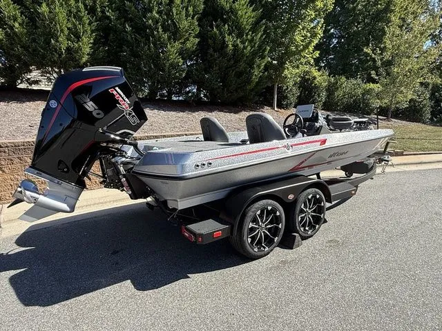 Slide: The Image of 2026 Ikon Boats VLX20 on trailer, featuring sleek design and powerful outboard motor. - 3