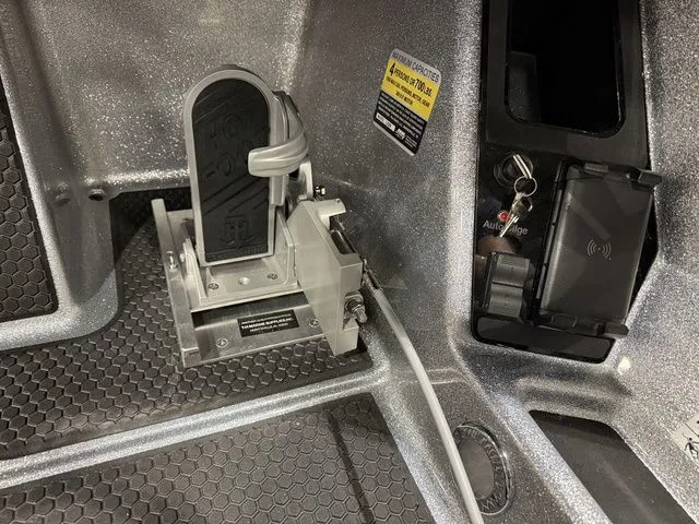 Slide: The Image of Pedal and control panel inside 2026 Ikon Boats LXE20, featuring advanced technology and design. - 6