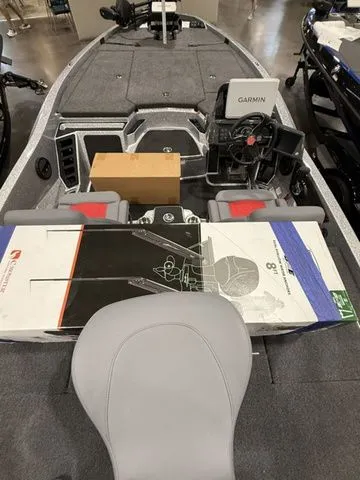 Slide: The Image of 2026 Ikon Boats LXE20 interior with Garmin system and seating. - 7