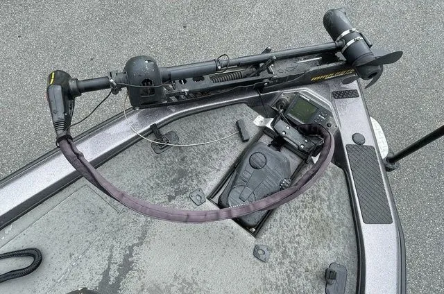 Slide: The Image of 2008 Bee Line Super Vee boat deck with trolling motor and control panel. - 12