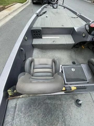 Slide: The Image of 2008 Bee Line Super Vee boat interior with gray seating and deck. - 8