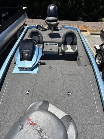 Slide: The Image of 2021 Vexus AVX1880 boat interior with seating and storage compartments. - 11