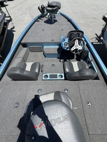 Slide: The Image of 2021 Vexus AVX1880 boat interior with steering console and seating. - 3