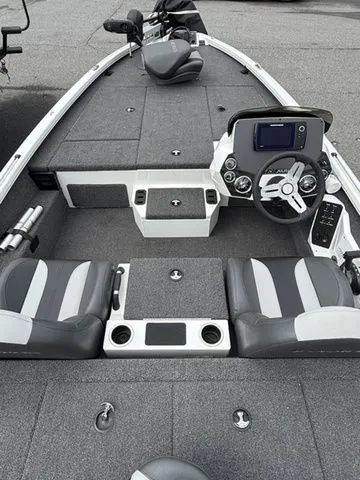 Slide: The Image of 2022 Vexus AVX1880 boat interior with modern dashboard and seating. - 4