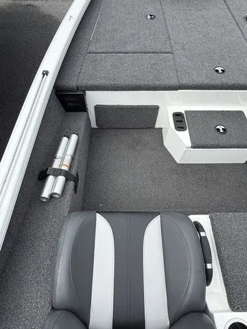 Slide: The Image of 2022 Vexus AVX1880 boat interior with gray seating and storage compartments. - 7