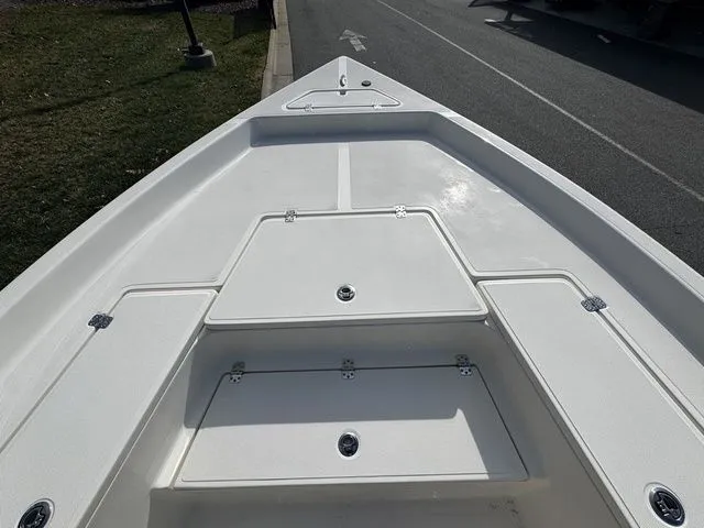 Slide: The Image of Bow view of 2025 Bulls Bay 2400 boat with storage compartments. - 7