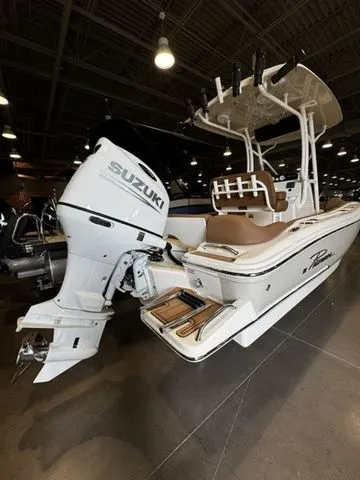 Slide: The Image of 2025 Pioneer ISLANDER 202 boat with Suzuki outboard motor in showroom. - 3
