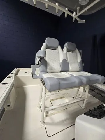 Slide: The Image of 2025 Avenger Boats AV26 interior with dual cushioned seats in a sleek, modern design. - 5