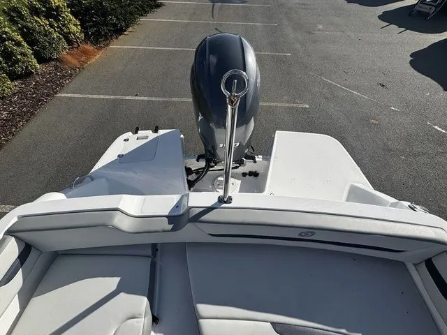 Slide: The Image of 2023 Hurricane SunDeck Sport 205 OB boat, rear view with outboard motor. - 12