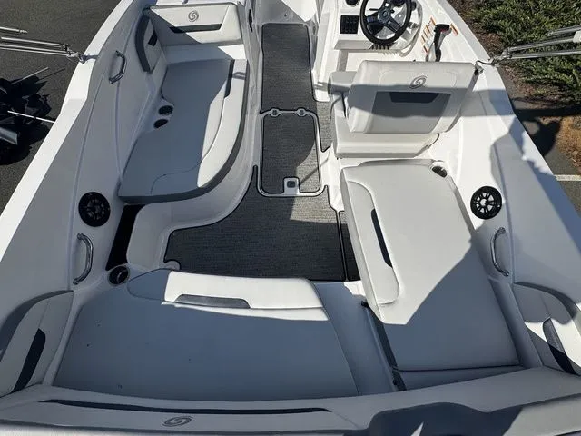 Slide: The Image of 2023 Hurricane SunDeck Sport 205 OB boat interior with spacious seating and modern design. - 5