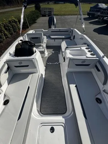 Slide: The Image of 2023 Hurricane SunDeck Sport 205 OB boat interior with spacious seating and modern design. - 9