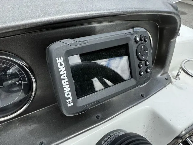 Slide: The Image of Lowrance GPS system on 2021 Hurricane SunDeck Sport 201 OB boat dashboard. - 6