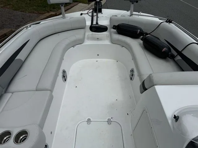Slide: The Image of 2021 Hurricane SunDeck Sport 201 OB boat interior with spacious seating and cup holders. - 7