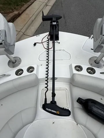 Slide: The Image of 2021 Hurricane SunDeck Sport 201 OB boat deck with Minn Kota trolling motor. - 9