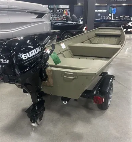 Slide: The Image of 2025 Crestliner 1436L CR Jon boat with Suzuki outboard motor on display in showroom. - 2