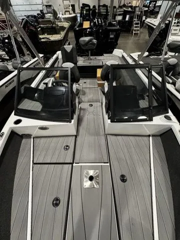 Slide: The Image of 2024 Vexus ADX190 boat interior with sleek gray decking and dual consoles. - 10