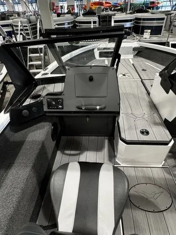 Slide: The Image of 2024 Vexus ADX190 boat interior with sleek seating and modern dashboard design. - 6