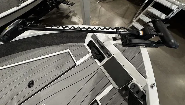 Slide: The Image of 2024 Vexus ADX190 boat deck with trolling motor and control panel. - 9