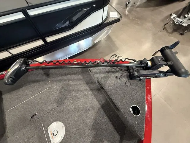 Slide: The Image of 2025 Crestliner 1750 Hawk boat with trolling motor on deck, showcasing modern fishing features. - 9