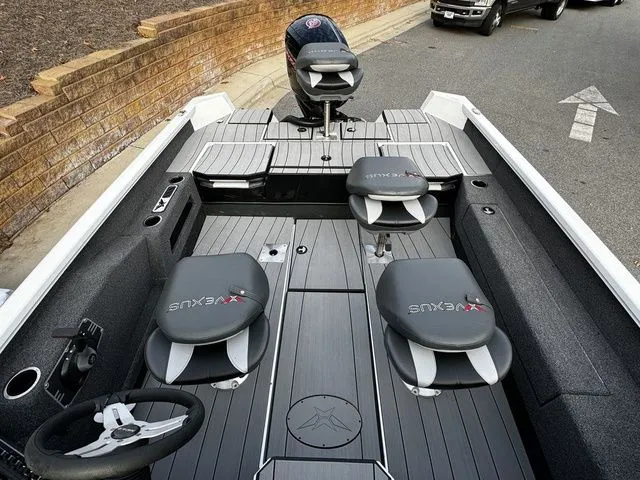 Slide: The Image of 2024 Vexus ADX180 boat interior with sleek seating and modern design. - 12