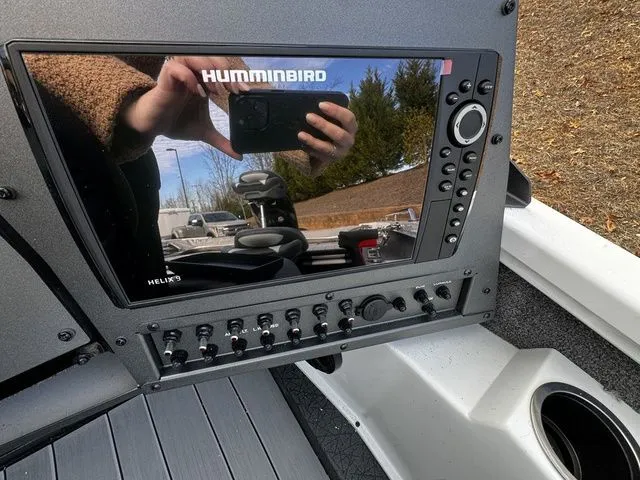 Slide: The Image of 2024 Vexus ADX190 boat dashboard with Humminbird Helix fishfinder display. - 9
