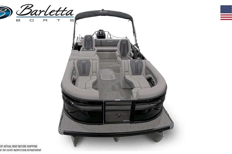 Slide: The Image of Aerial view of Rock Outdoors store with parked vehicles, including a 2025 Barletta Corsa 23UC boat. - 7