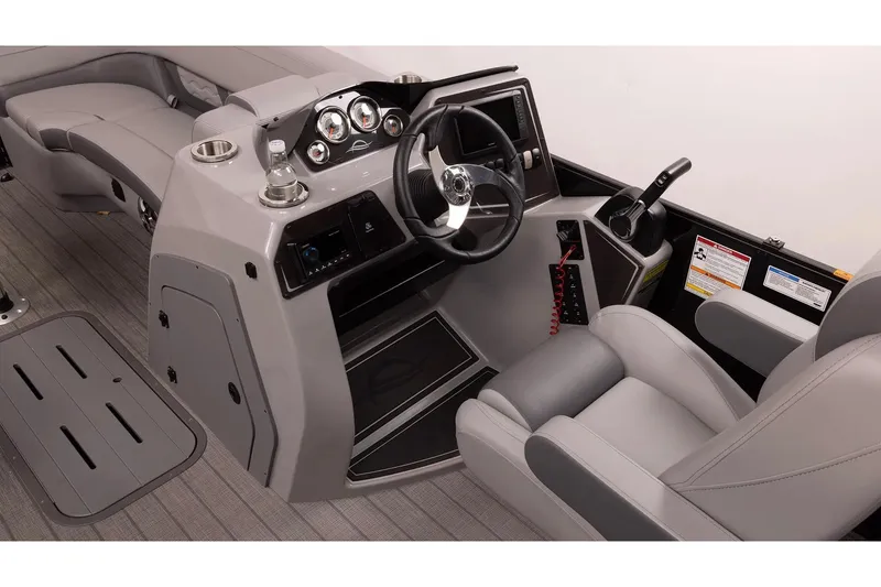 Slide: The Image of 2024 SunCatcher Select 322SS boat interior with modern dashboard and comfortable seating. - 10
