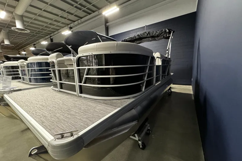 The Image of 2025 Godfrey Xperience 1886 CX pontoon boat displayed indoors. - 0