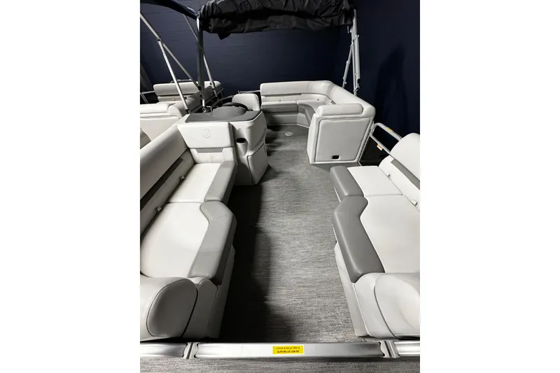 Slide: The Image of 2025 Godfrey Xperience 1886 CX pontoon boat interior with spacious seating and modern design. - 3