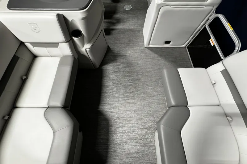 Slide: The Image of Interior of 2025 Godfrey Xperience 1886 CX pontoon boat with gray and white seating. - 4