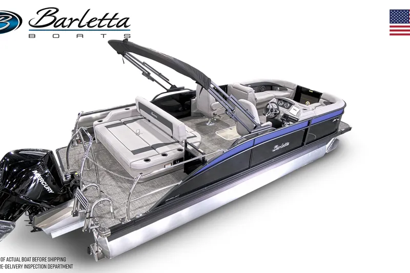 Slide: The Image of 2025 Barletta A22UC pontoon boats displayed in a showroom. - 7